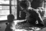 Josie Mae Jones sitting on a chair inside her home on Clayton Alley in Montgomery, Alabama.