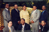 Ethnic Alumni Association members pose together at a formal event, 2001