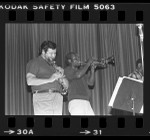 Ruben Leon and trumpet player performing in Black and Brown Brotherhood Band, Los Angeles, Calif., 1979