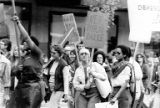 Bakke Decision Protest depicting people marching and holding protest signs in Seattle, Washington, 1977