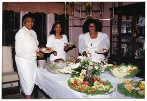 Links Women Standing at Food Table During Dorothy Washington Celebration