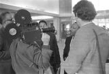 Martin Luther King, Jr., being interviewed at the airport in Montgomery, Alabama.