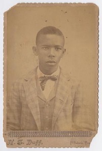 Unidentified Young African American Man in Suit