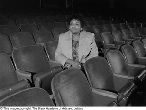 Dr. Versia Lacy seated in empty auditorium #3