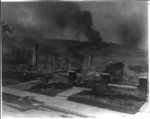 [Smoldering ruins of African American's homes following race massacre in Tulsa, Okla., in 1921]