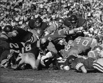 USC and UCLA players scrimmaging on the field, Los Angeles,1977