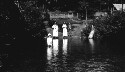 Unidentified group walking on a bridge