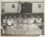 Mississippi State Sovereignty Commission photograph of seven African American women wearing formal dresses at a fashion show held at Farish Street Baptist Church, Jackson, Mississippi, 1950s