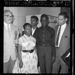 Attorney A. L. Wirin with Rena Frye and her sons, Ronald and Marquette at Los Angeles courthouse, 1965