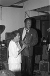 Lou Rawls performing at the Pied Piper nightclub with his mother, Los Angeles, 1989