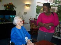 Evelyn Estevan Talks with a Student, circa 2009