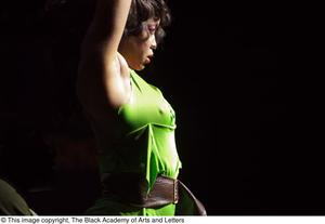 Performer in green dress dancing