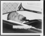 The body of Malcolm X, slain Negro nationalist leader, lies in casket at the Unity Funeral Home, Eighth Ave. and 126th St.