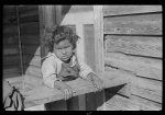 [Untitled photo, possibly related to: Child of mixed-breed Indian, white and Negro, near Pembroke Farms, North Carolina]