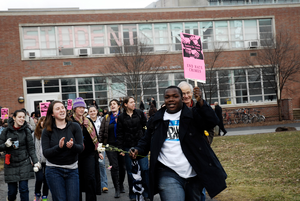 Justice for Jason rally at UMass Amherst: protesters marching from the Student Union Building in support of Jason Vassell