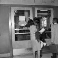 Freedom Riders Lucretia Collins and Catherine Burks Brooks attempting to enter a restaurant at the Greyhound station in Birmingham, Alabama.