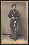 [First Lieutenant Lewis Hardy of Co. C, 3rd Minnesota Infantry Regiment in uniform and fur hat with sword]