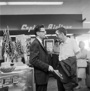 Freedom Rider James Peck with another man at a souvenir counter at the airport in Birmingham, Alabama, waiting to board a flight for New Orleans.