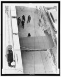 Thumbnail for Policeman maintains watch from roof of Unity funeral home where body of Malcolm X is reposing