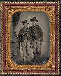 [Two unidentified soldiers in Union uniforms, one with 9th cavalry insignia on hat, the other holding a revolver]