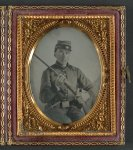 [Unidentified soldier in Confederate uniform with conversion musket and small Bowie knife]