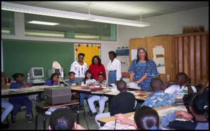 Women and Students in Gates Elementary Classroom