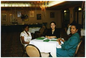 Seated Women Around Table at Service to Youth Award Program