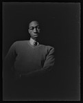 Spring class portrait of man in sweater and tie, California Labor School