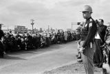 Civil rights marchers kneeling in prayer on the south side of the Edmund Pettus Bridge in Selma, Alabama, on Turnaround Tuesday.