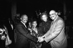 Willie Brown shaking hands at a Black Women's Forum event, Los Angeles, 1989