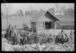 [Untitled photo, possibly related to: Corn shucking on Uncle Henry Garrett's place, Negro tenant of Mr. Fred Wilkins. White women don't go to Negro shucking to help with the cooking but whites are fed by Negro women just the same as at other shucking week previous at Mr. Fred Wilkins' home. Tally Ho, near Stem, Granville County, North Carolina]