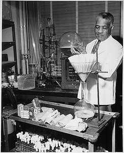 "William R. Carter, government pharmacist for 40 years... As [a] laboratory aide in the Food and Drug Administration of the Federal Security Agency, he is entrusted with the job of preparing media for testing the sterility of bandage material."