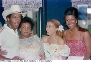 Photograph of Tony Dorsett, Mollie Williams, and two other individuals