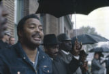 Hosea Williams speaking to demonstrators outside the Jefferson County courthouse in Bessemer, Alabama, during the incarceration of Martin Luther King, Jr., and several other civil rights leaders.