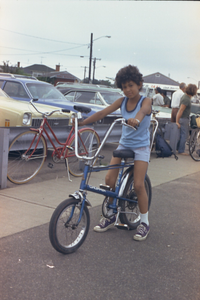 Jay Cowan [on a bike with his head tilted : chromogenic photonegative]