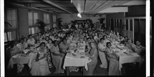 Group of women at a dinner for Miner Teachers College : cellulose acetate photonegative, banquet camera format