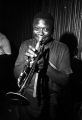 Bennie "Buckwheat" Payne playing the trumpet on stage at the Laicos Club in Montgomery, Alabama.