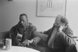 Thumbnail for James ""Son"" Thomas: Houston, Tex. Modern Language Association Meeting. James ""Son"" Thomas and Allen Ginsburg. Thomas playing guitar (JTP 50-80-12/31 #1689)