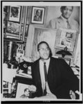 [Malcolm X, half-length portrait, seated, facing right, during press conference in offices of the National Memorial African Book Store, New York City]