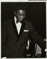 Photographs of Nat King Cole on stage at the Sands