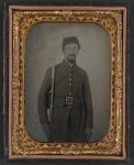 [Unidentified private in Confederate uniform and Georgia frame buckle with bayoneted musket]