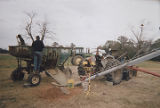 Kaleb and Earl Datcher working on the family farm in Harpersville, Alabama.