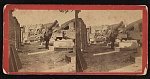 [Fort Sumter interior with a soldier standing near the artillery]