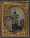 [Colonel Felix L. Price of Co. I, 14th Georgia Infantry Regiment, in uniform and CS buckle with books]