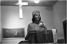 Coretta Scott King speaking to an audience of women at Hall Street Baptist Church in Montgomery, Alabama.