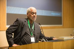 Charles Johnson speaking from podium during keynote