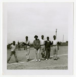 Teenagers on a Baseball Field