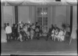 Group portrait of men and women performers