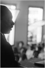 Martin Luther King, Jr., speaking to an audience in a church building, probably First Baptist Church in Eutaw, Alabama.