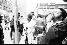 Boycott; Protester Hosea Williams, with portable microphone, downtown Atlanta, Georgia, April 11, 1970